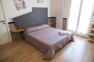 Postel nebo postele na pokoji v ubytování Avezzano 3e60