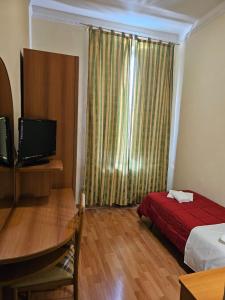 Μια τηλεόραση ή/και κέντρο ψυχαγωγίας στο Hotel Liberty