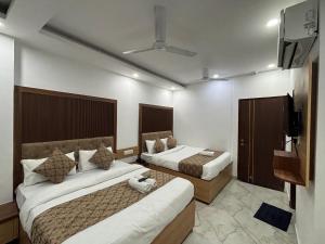 Postel nebo postele na pokoji v ubytování Hotel C & G 4 Minuit Walkable New Delhi Railway Station & 7 Minit VFS Shivaji Stadium Metro Station