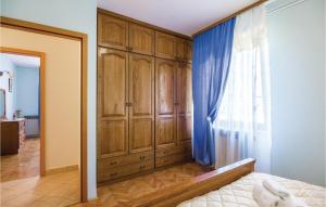 Posteľ alebo postele v izbe v ubytovaní Nice Apartment In Veprinac With Wifi