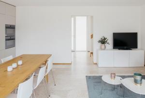 TV a/nebo společenská místnost v ubytování Apartment Löwengarten 26