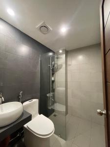 Koupelna v ubytování Joane Suites by Hotel Cara