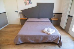 Postel nebo postele na pokoji v ubytování Avezzano 3e60