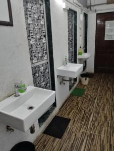 Koupelna v ubytování Bapuji Dormitory Hostel Mumbai