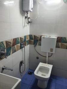 Koupelna v ubytování Bapuji Dormitory Hostel Mumbai