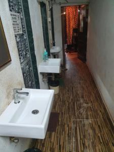 Koupelna v ubytování Bapuji Dormitory Hostel Mumbai