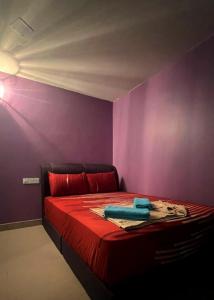 Postel nebo postele na pokoji v ubytování ARK Business Rawang hotel