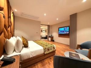 Katil atau katil-katil dalam bilik di The Olive Hotel Srinagar