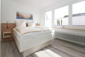 Ένα ή περισσότερα κρεβάτια σε δωμάτιο στο Duenentraum-II