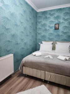Postel nebo postele na pokoji v ubytování Hotel bereka