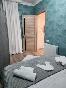 Postel nebo postele na pokoji v ubytování Hotel bereka