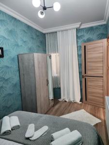 Postel nebo postele na pokoji v ubytování Hotel bereka