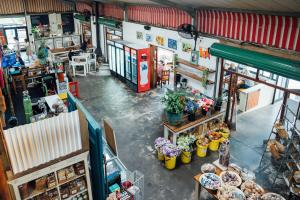 an overhead view of a shop with flowers and food at Lavender BnB in East London