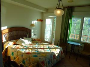 Letto o letti in una camera di Apartamentos Turísticos Cumbres Verdes