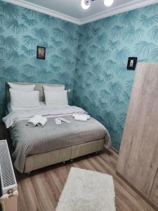 Postel nebo postele na pokoji v ubytování Hotel bereka