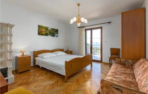 Posteľ alebo postele v izbe v ubytovaní 5 Bedroom Amazing Home In Klenovica
