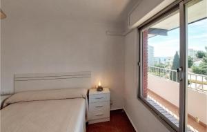 A bed or beds in a room at Pet Friendly Apartment