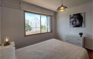 A bed or beds in a room at Pet Friendly Apartment