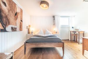 Postel nebo postele na pokoji v ubytování Hotel Kaiserstuhl