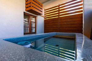a swimming pool in the middle of a room at Wanderer Sighisoara in Sighişoara