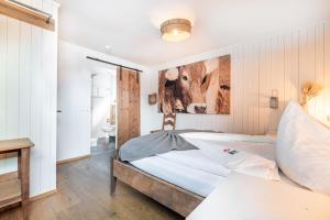 Postel nebo postele na pokoji v ubytování Hotel Kaiserstuhl