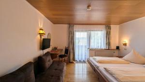 Postel nebo postele na pokoji v ubytování Hochschwarzwald-Hof