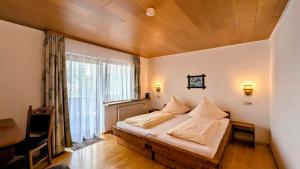 Postel nebo postele na pokoji v ubytování Hochschwarzwald-Hof