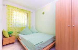 Postel nebo postele na pokoji v ubytování Lovely Apartment In Crikvenica