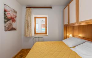 Postel nebo postele na pokoji v ubytování Pet Friendly Apartment In Zambratija