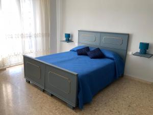 Ένα ή περισσότερα κρεβάτια σε δωμάτιο στο Il Lupo e la Volpe
