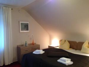 Postel nebo postele na pokoji v ubytování Hotel Sonnenhof