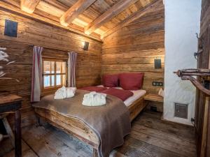 Ein Bett oder Betten in einem Zimmer der Unterkunft Buccara Zwischenbachalm