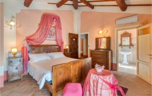 Łóżko lub łóżka w pokoju w obiekcie Villa Pieve, Lucignano