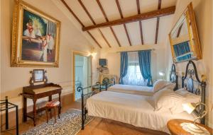 Łóżko lub łóżka w pokoju w obiekcie Villa Pieve, Lucignano