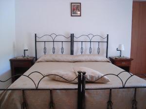 Кровать или кровати в номере B&B Sole del Pollino