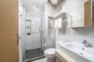 Ένα μπάνιο στο Hantao AI Select International Apartment