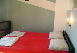 Postel nebo postele na pokoji v ubytování Apartments Nebo