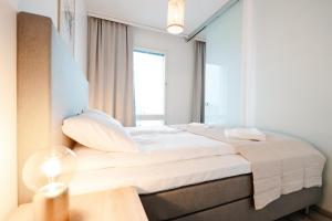 Katil atau katil-katil dalam bilik di Holiday Apartment Aava 6