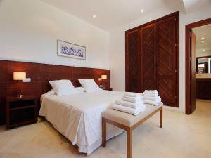 Ένα ή περισσότερα κρεβάτια σε δωμάτιο στο Apartment in Ibiza near Cala Vadella Beach +32 φωτογραφίες