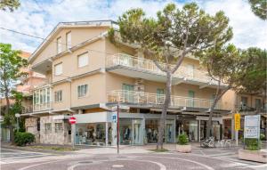 an apartment building on the corner of a street at Cozy Apartment In Cattolica With Wifi in Cattolica