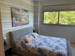 A bed or beds in a room at Alquiler Vacacional Salou W&S