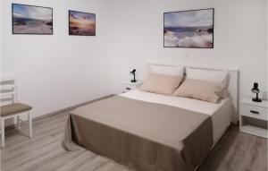 Postel nebo postele na pokoji v ubytování 2 Bedroom Gorgeous Apartment In Rabac