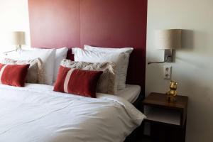 Postel nebo postele na pokoji v ubytování City Hotel Gouda, WorldHotels Crafted Collection