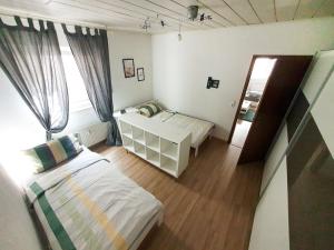 Postel nebo postele na pokoji v ubytování Apartment in Limeshain