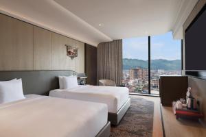 Rúm í herbergi á Hilton Kathmandu