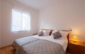 Postel nebo postele na pokoji v ubytování Holiday Home Mala Lozna Ii