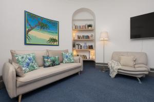 Posedenie v ubytovaní Spacious Apartment in the Warsaw City Center by Noclegi Renters