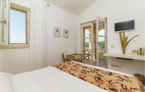 Postel nebo postele na pokoji v ubytování Three-Bedroom Holiday Home In Stifanici