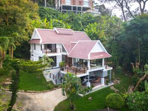 an aerial view of a house with a red roof at patong hill villa 3 in Patong Beach