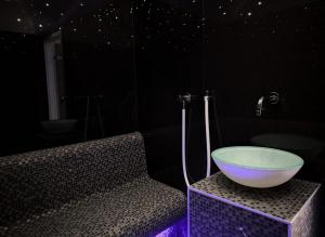 a bathroom with a bowl on top of a counter at Pansion Leggero in Krk +30 photos